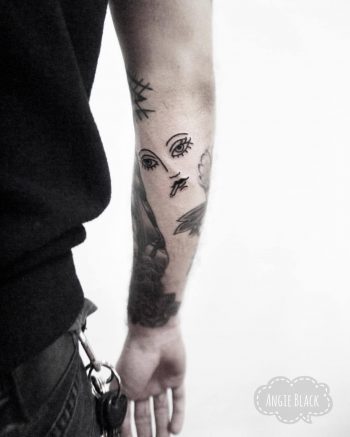 Woman face tattoo by Angie Noir