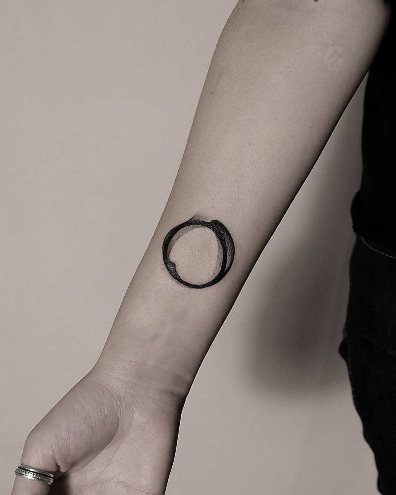 Zen circle tattoo by Roman Melnikov Plebey Boy