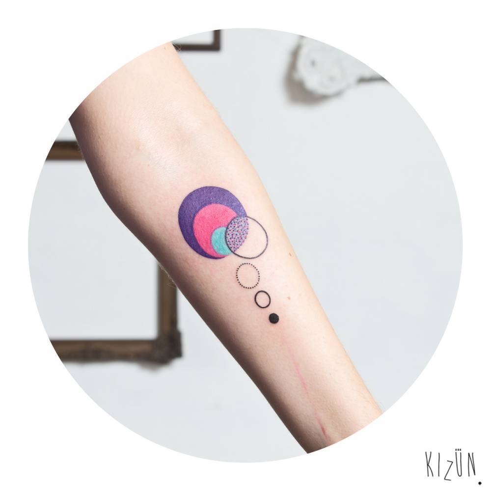 Abstract colorful circles tattoo