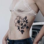 Anemone and wild roses tattoo