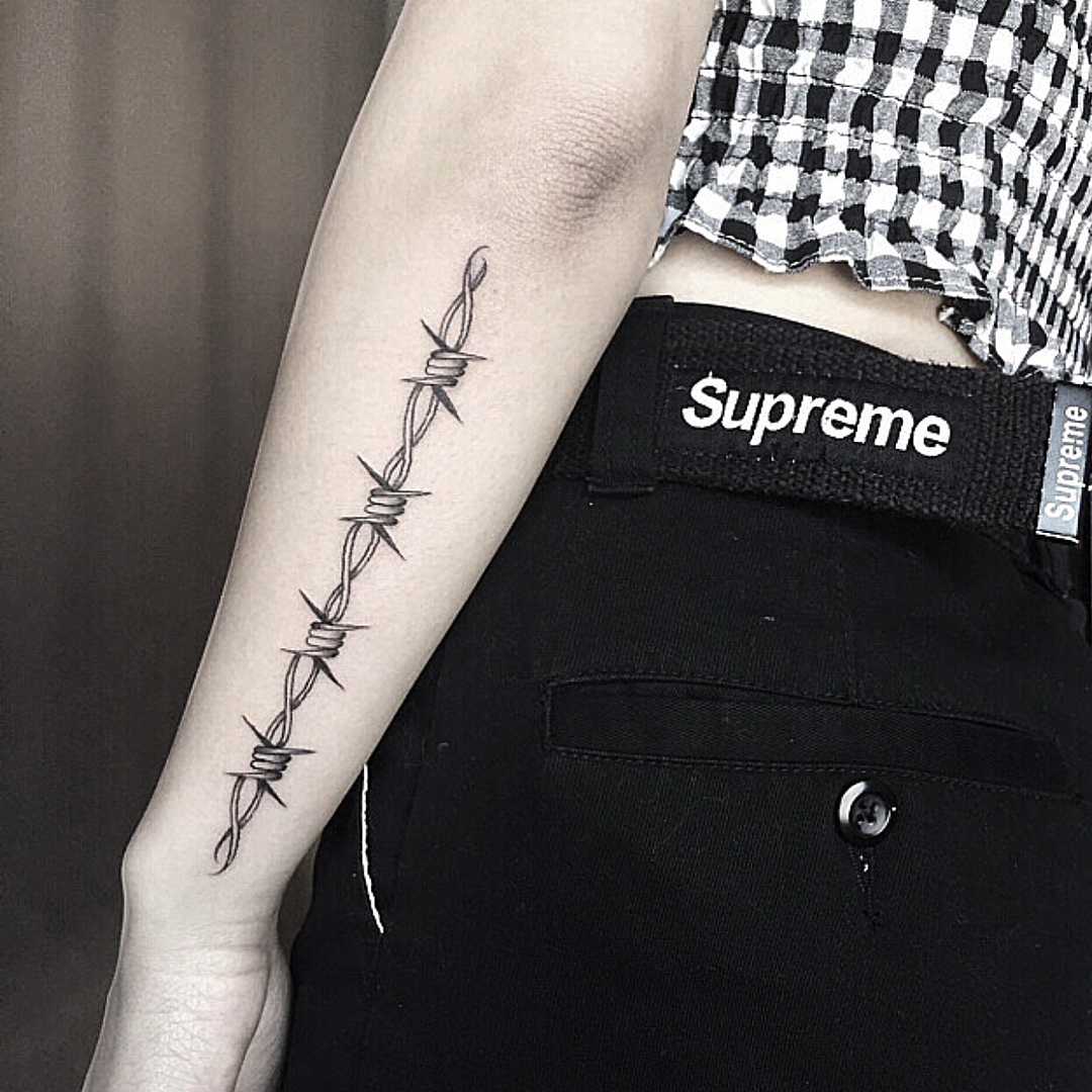 Barbed wire line tattoo