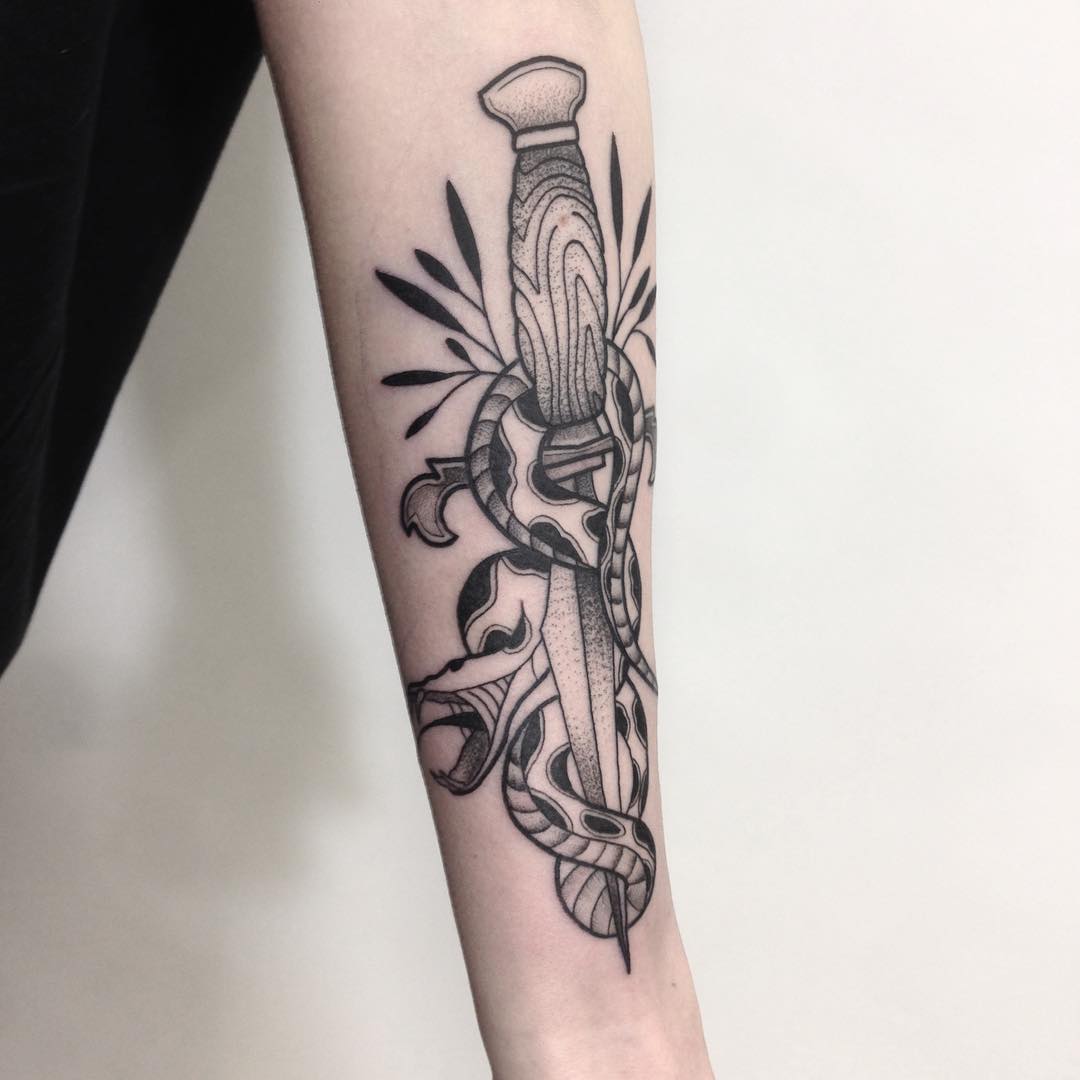 Black and grey dagger snake tattoo