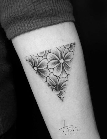 Black and grey floral triangle tattoo