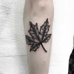 Black maple leaf tattoo by Deborah Pow