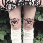 Black roses on both thighs