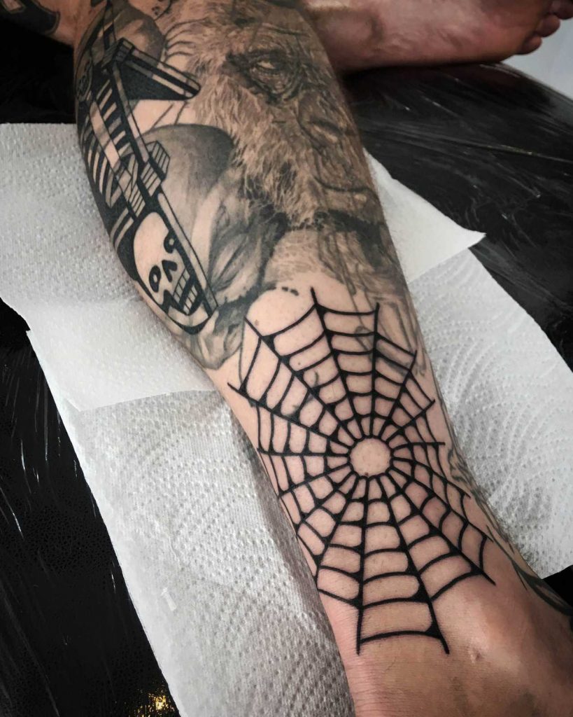 Black solid spider web tattoo 