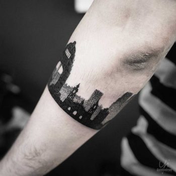 Blackwork cityscape tattoo