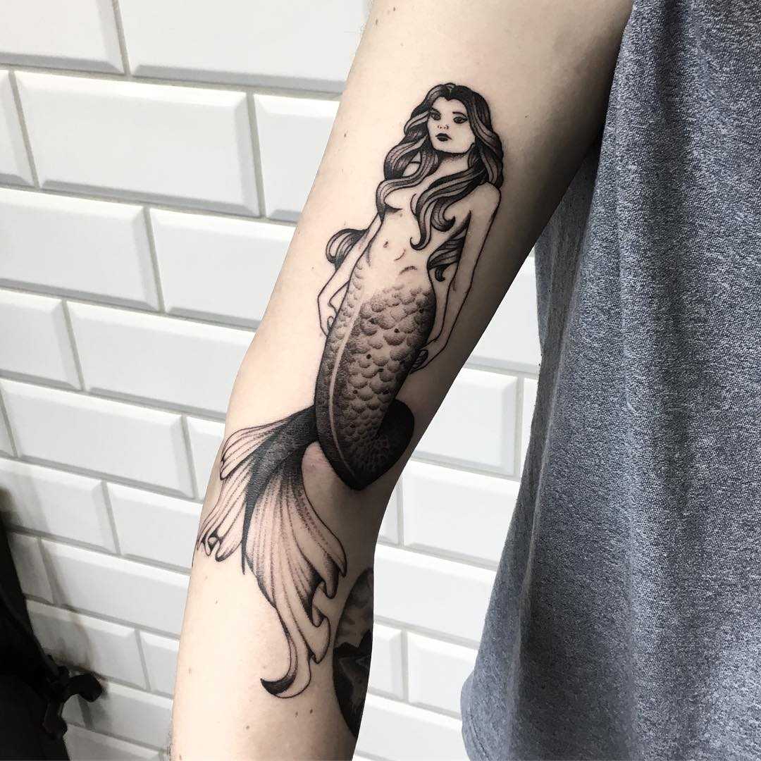 Blackwork mermaid tattoo
