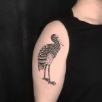 Blackwork stork tattoo by Yakes