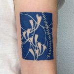 Blue cyano tattoo by Agata Agataris