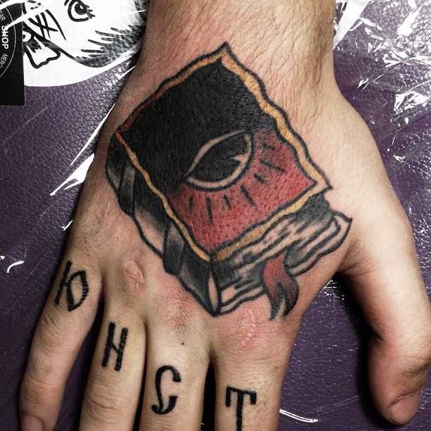 Book tattoo by Eugene Dusty Past
