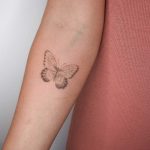 Butterfly tattoo by Iris Art