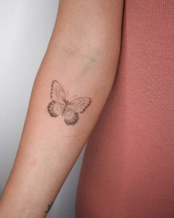 Butterfly tattoo by Iris Art