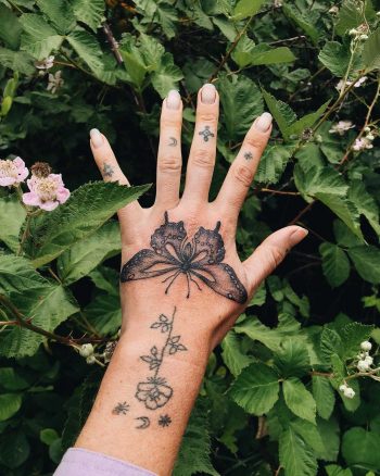 Butterfly tattoo on the left hand