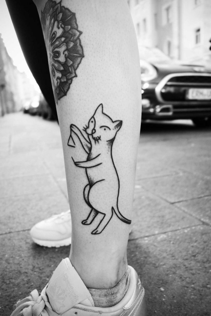 Cat triangle player tattoo