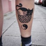 Cats in a basket tattoo