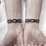 Chain link bracelet tattoos by Deborah Pow