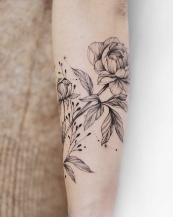 Classic botanical tattoo