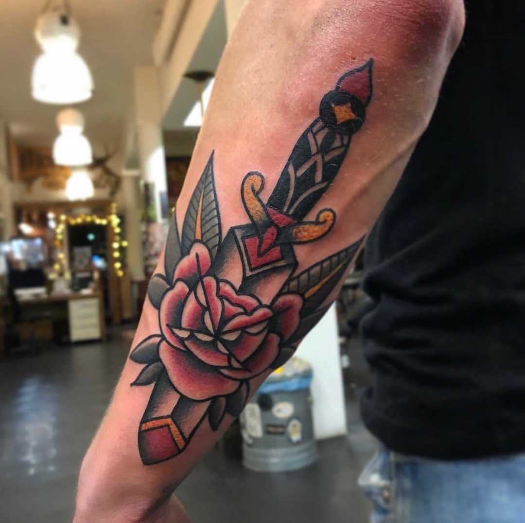 Classy dagger and rose tattoo