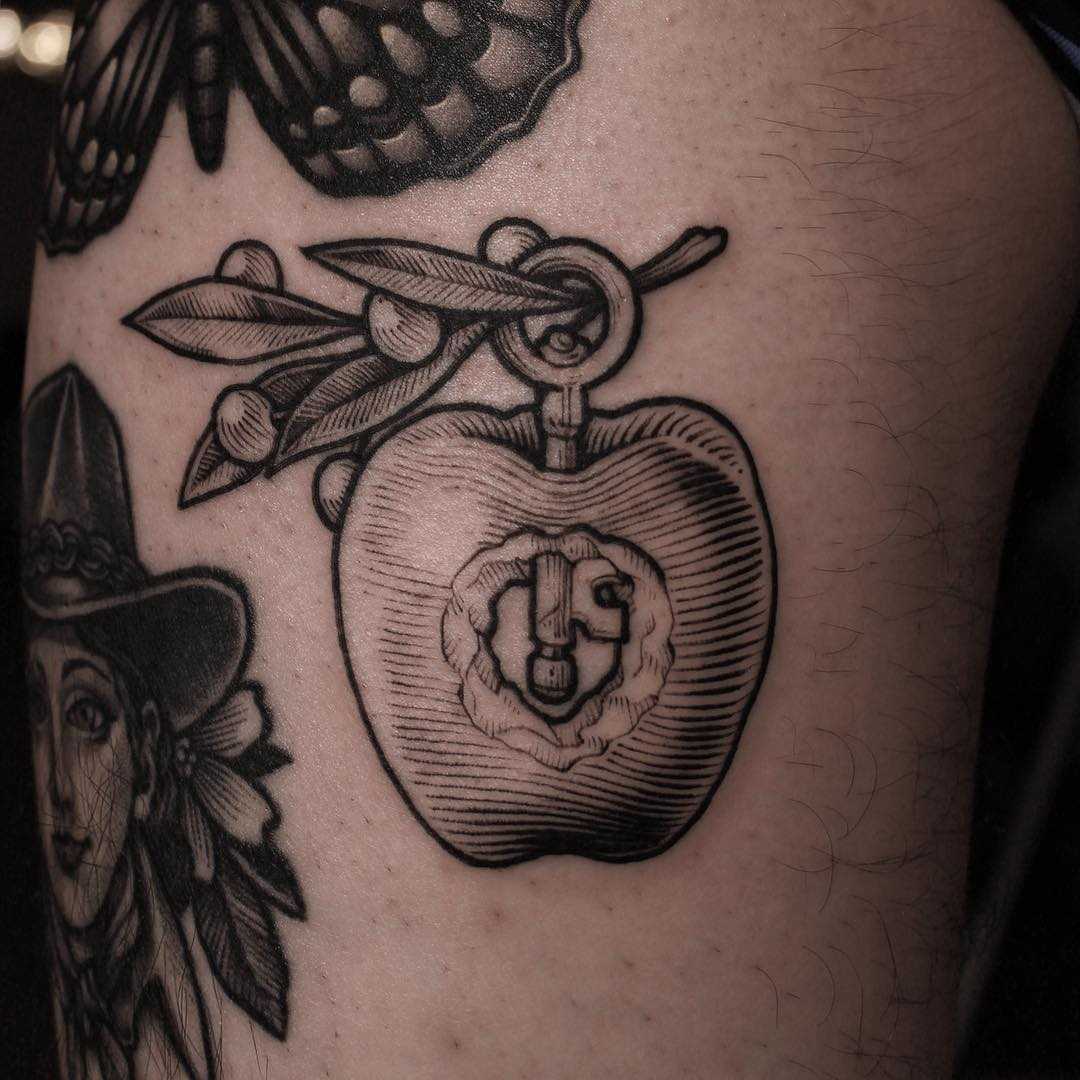 Clockwork apple tattoo