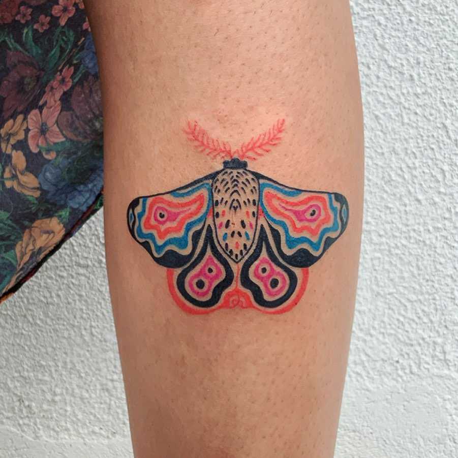 Colorful butterfly tattoo by Agata Agataris