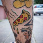 Colorful pizza slice tattoo