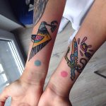 Colorful wrist tattoos by Eugene Dusty Past