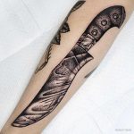 Cool knife tattoo by Monkey Bob