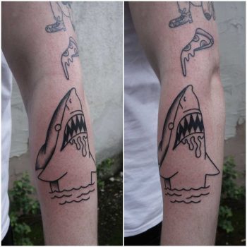 Cool shark tattoo on a forearm