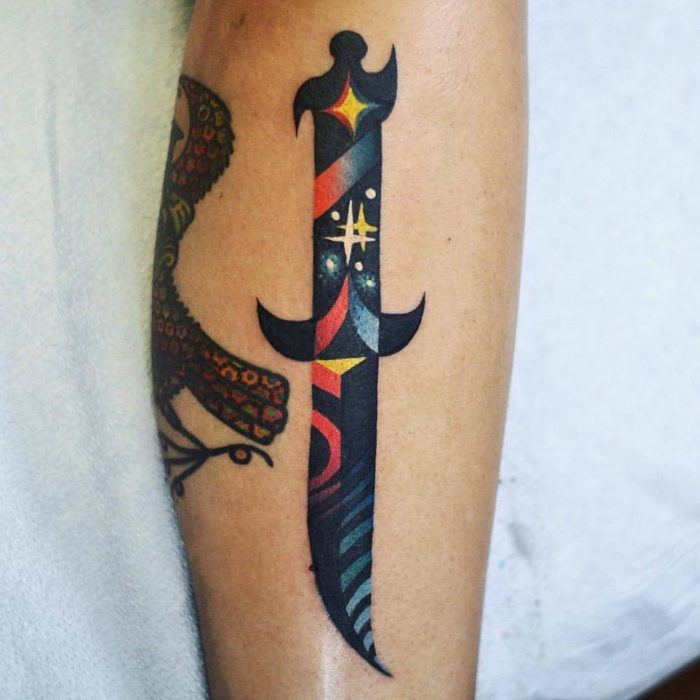 Cosmic knife tattoo by David Côté