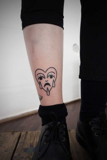 Crying heart tattoo on the shin
