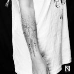 Custom forearm tattoo by Noam Yona