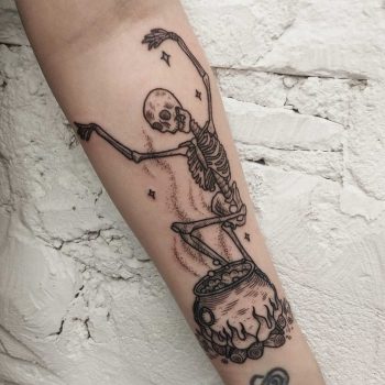Dancing skeleton and cauldron tattoo