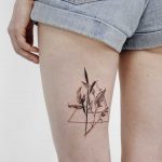 Delicate flowers and triangles tattoo