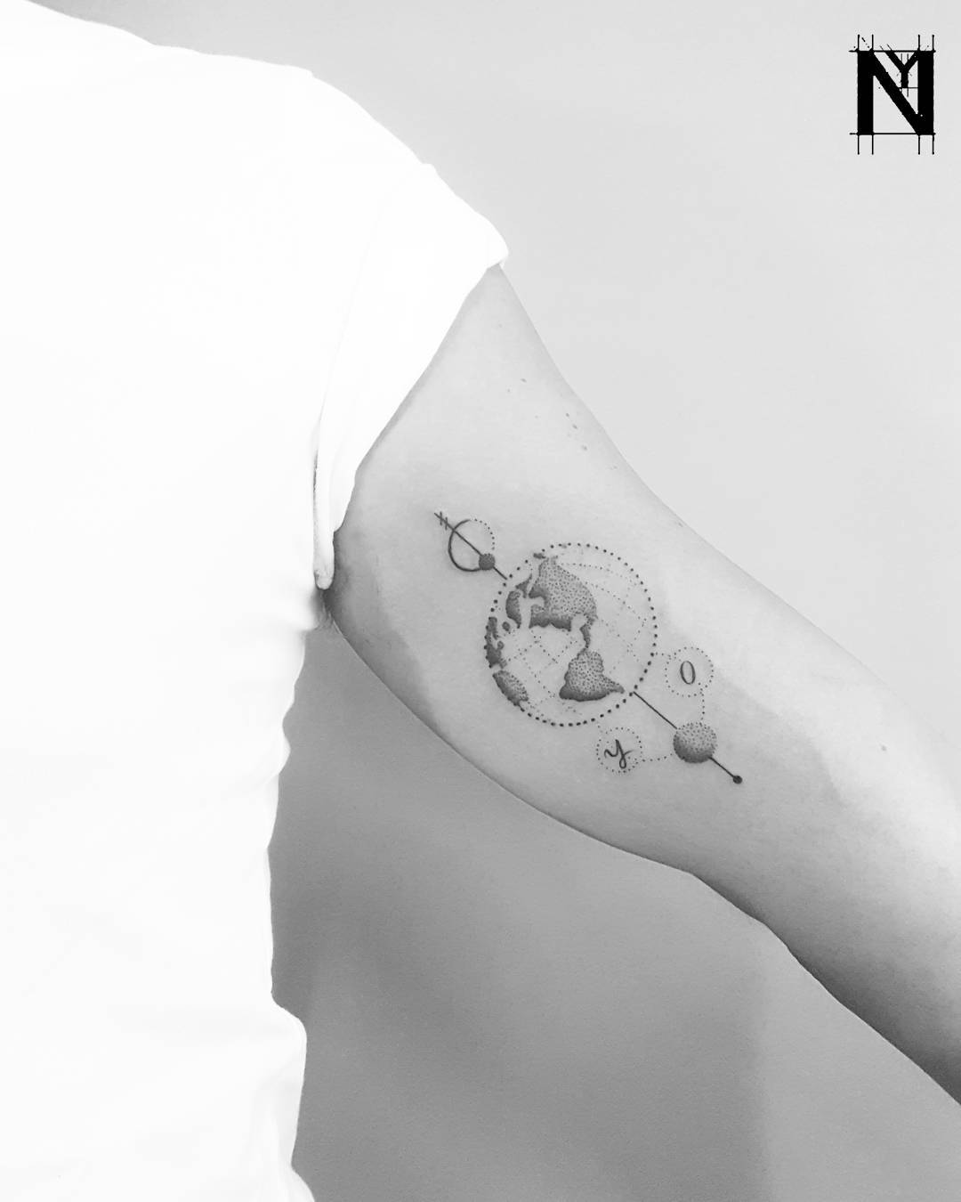 Dot-work earth and moon tattoo