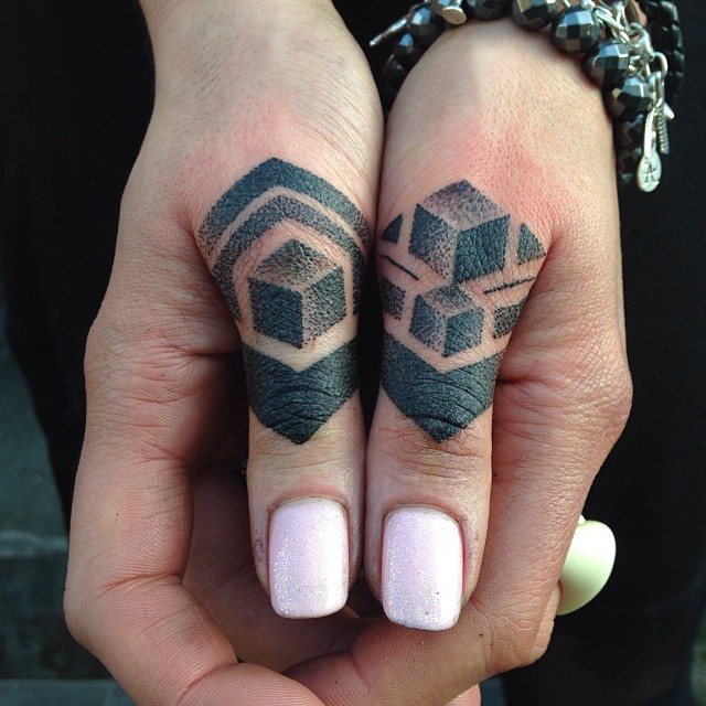 Dot-work thumb tattoos by Tamara Lee
