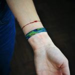 Earth-inspired bracelet tattoo by Valeria Yarmola