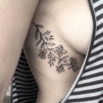 Flower branch tattoo by Kelly Kill Again