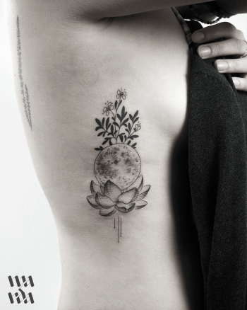 Full moon and Lotus flower tattoo