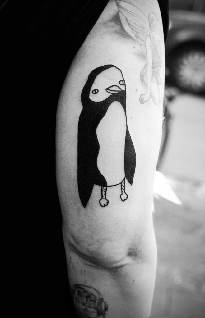 Funny penguin tattoo