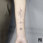 Gentle forearm tattoo by Noam Yona