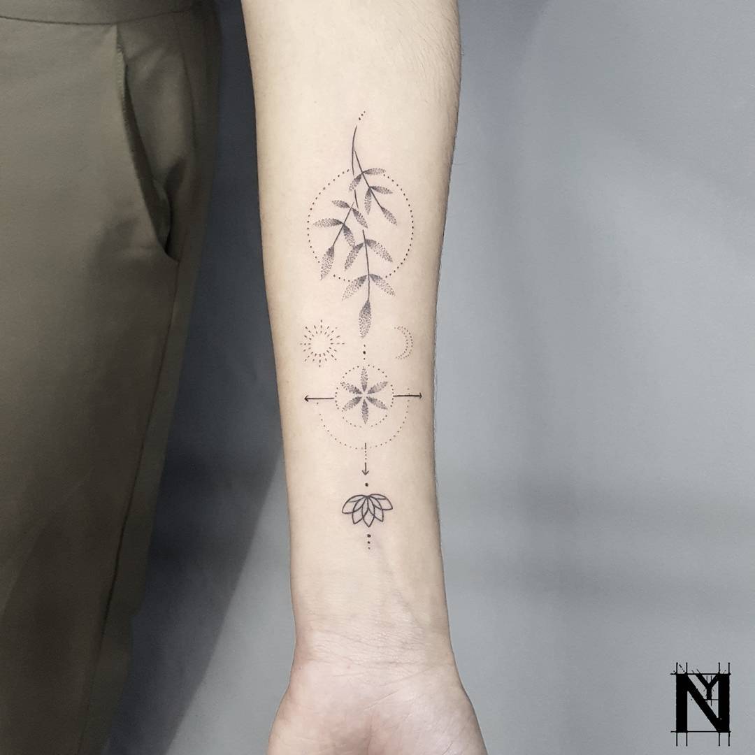 Gentle forearm tattoo by Noam Yona - Tattoogrid.net