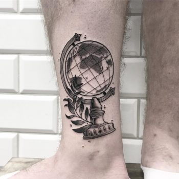 Globe tattoo on the ankle