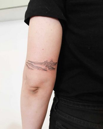 Hand-poked abstract waves ️tattoo by Kelli Kikcio