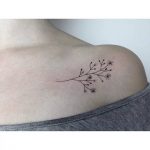 Hand-poked dry flowers tattoo