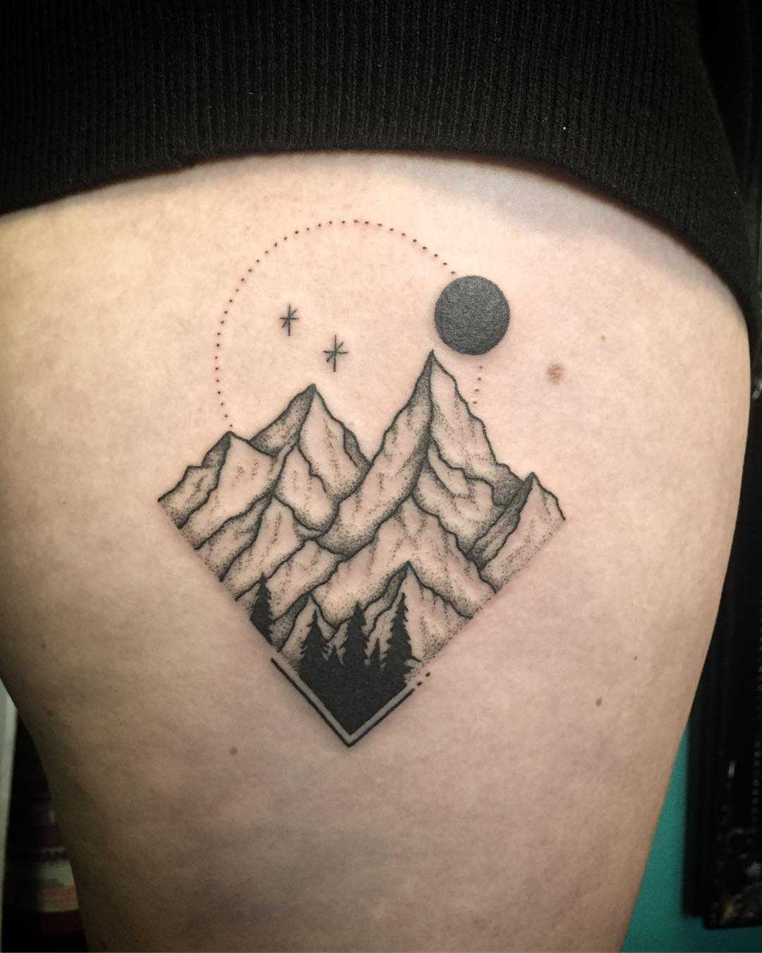 Hand-poked mountain scene by Kirk Budden