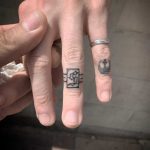 Hand-poked ring tattoo by Kirk Budden