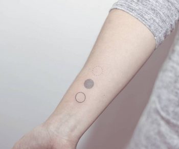 Hand-poked three circles tattoo