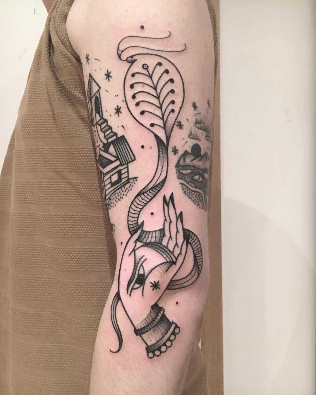 Hand snake tattoo