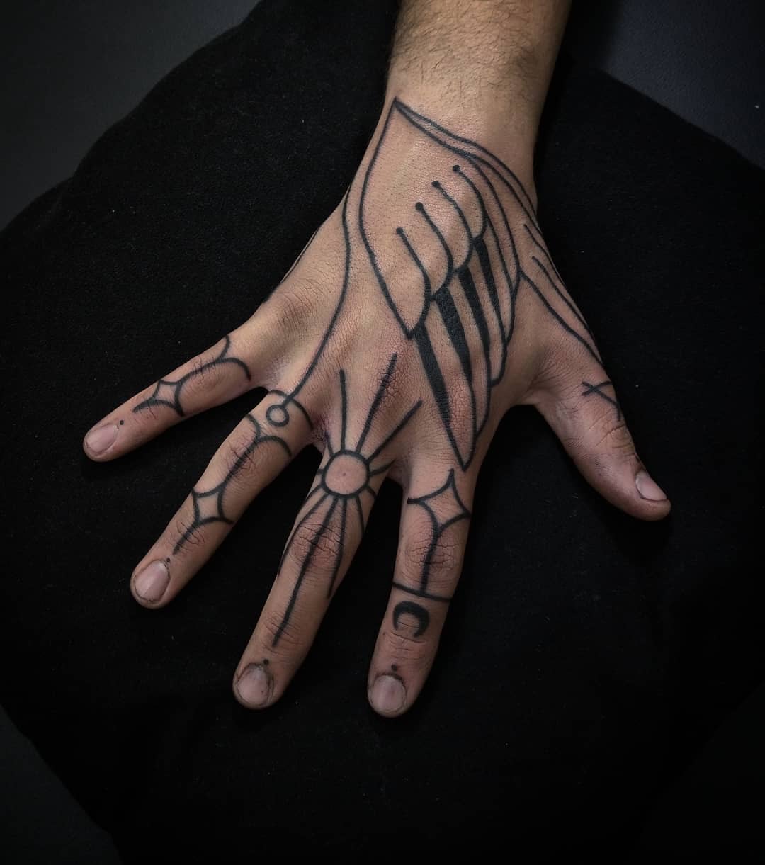 Hand tattoo by artist Meritattoon